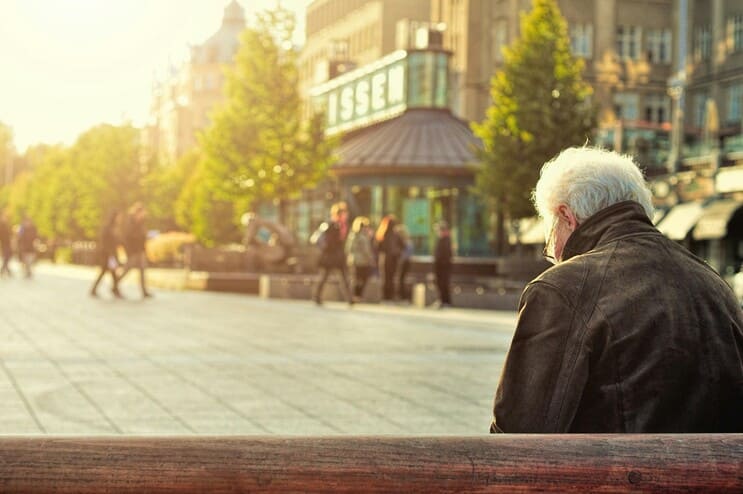 Old man sitting in Park - Smart Investment Strategies for Secure Retirement